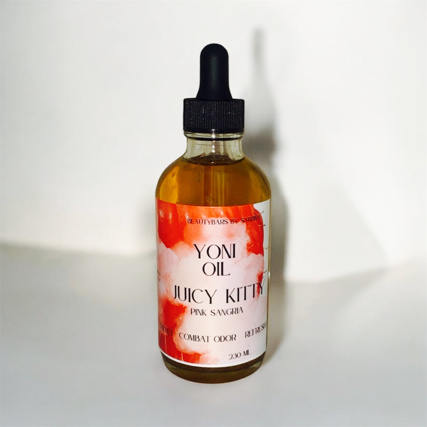 Juicy Kitty Yoni Oil-Pink Sangria-Combat Odor