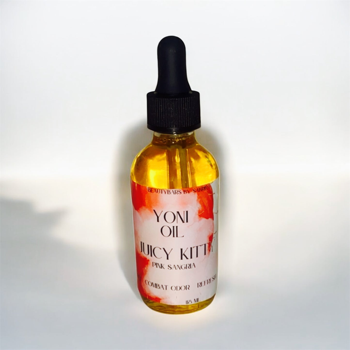 Juicy Kitty Yoni Oil-Pink Sangria-Combat Odor