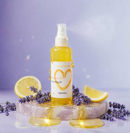 Bottle of lemon lavender body oil with slices of lemon and lavender flowers on a purple background