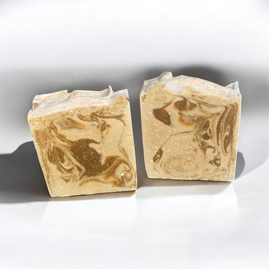 Two marbled soap bars on a white background