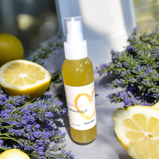 Body oil spray bottle with lemons and lavender on a textured surface