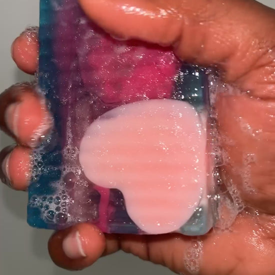 Video showing the soap lathering while being held in hand with white background 